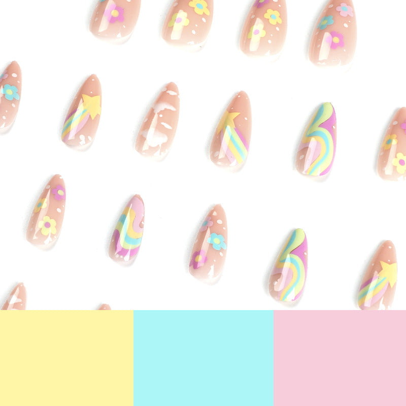 Artful nail art with cheerful designs and colorful accents Kalsten