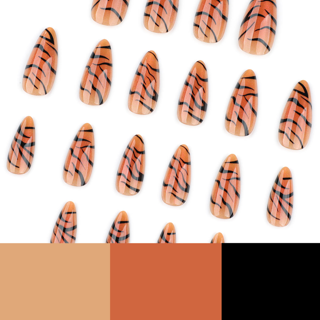 Artful stiletto nails with creative tiger stripe design Kalsten