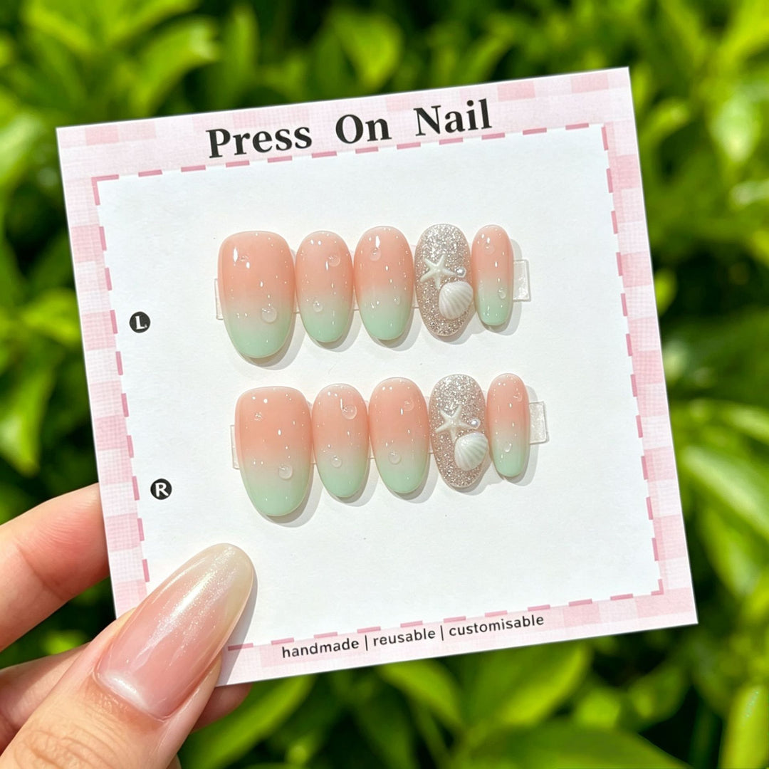 Artistic Press-On Nail Set with Shell and Star Accents