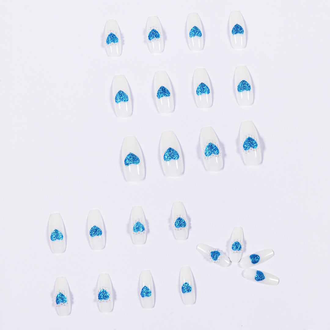 Artful nail art with heart-shaped accents Kalsten