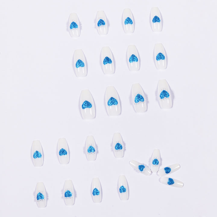 Artful nail art with heart-shaped accents Kalsten