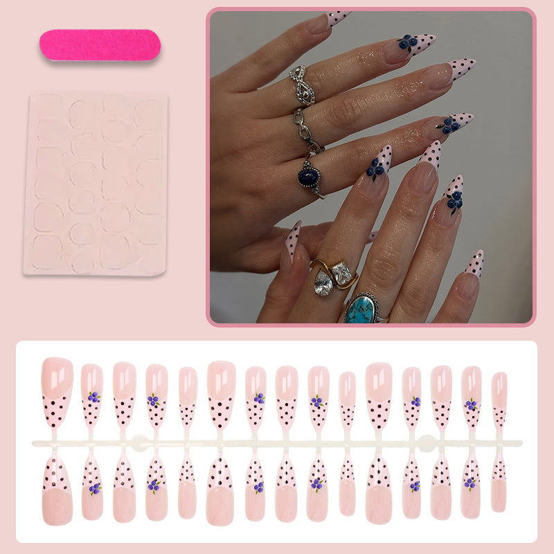 Acrylic nail set with stylish dots and floral embellishments Kalsten