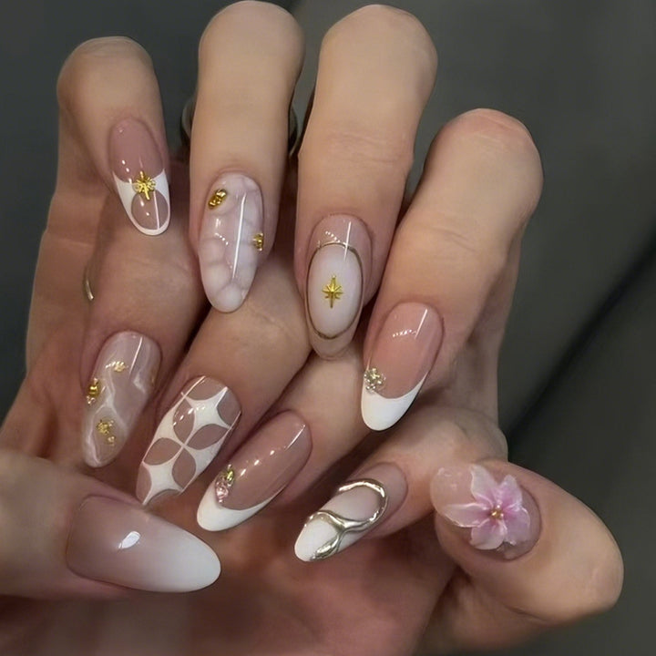 Acrylic nail set with romantic flowers and elegant design elements Kalsten