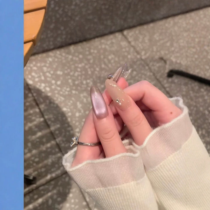 Elegant Long Stiletto Nail Extensions with Gem Accents