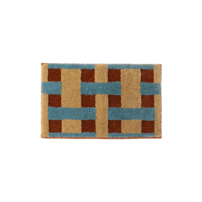 Rectangular tufted door mat with geometric block pattern and non-slip backing Kalsten