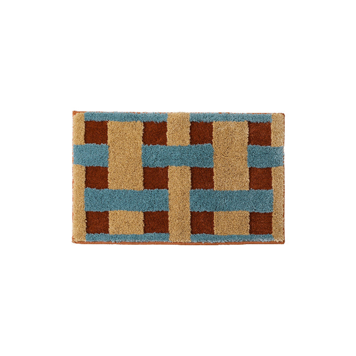Rectangular tufted door mat with geometric block pattern and non-slip backing Kalsten