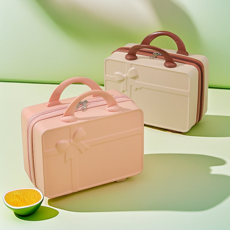 structured hard-shell cosmetic travel case with embossed bow and dual top handles Kalsten