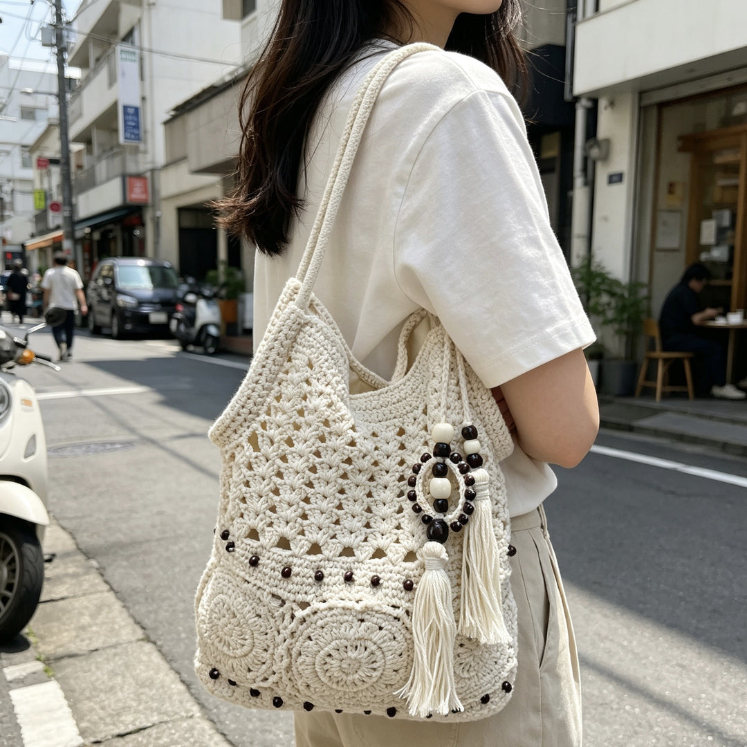 Hand-crocheted shoulder bag with unique fringe design Kalsten