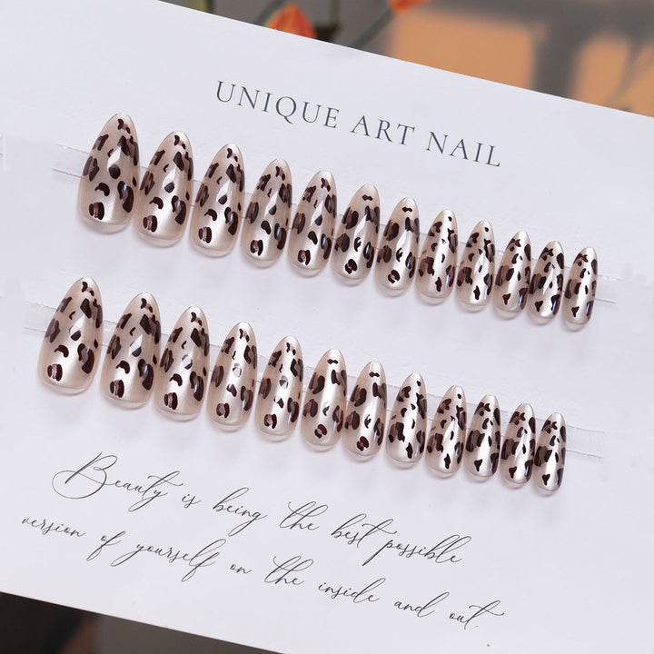 Artistic Stiletto Press-On Nail Design with Leopard Print