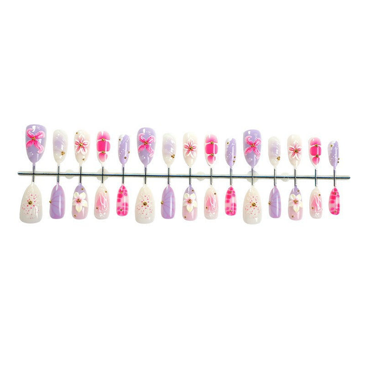 Acrylic nail set with elegant floral design and 3D accents Kalsten
