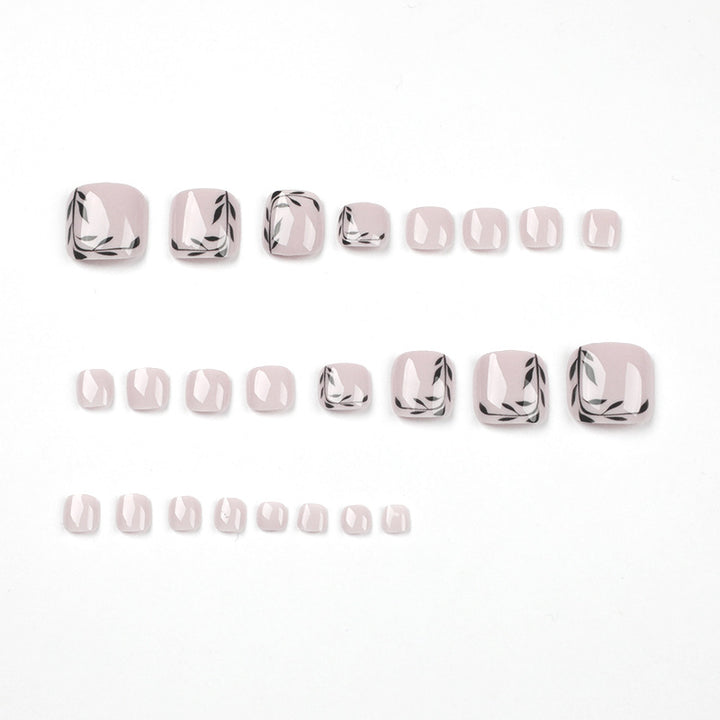 Artful toenail art with delicate leaf motifs Kalsten