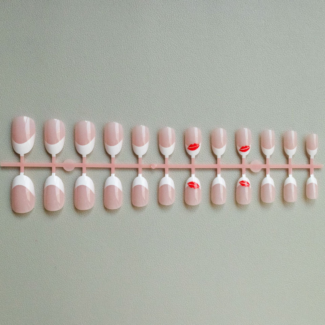 Artistic French Tip Nail Art Set with Kiss Design