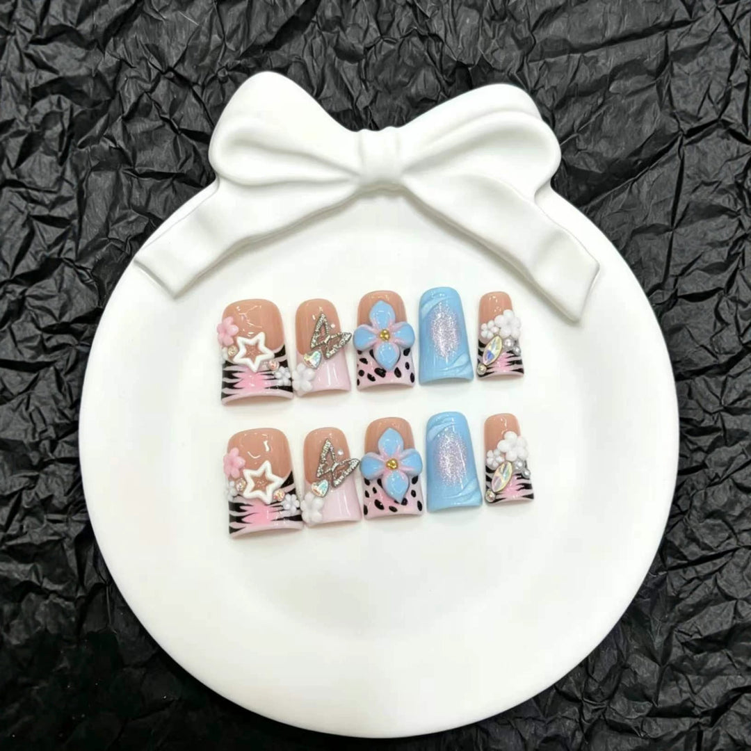 Artistic Nail Art Press-On Set with Floral and Gem Accents