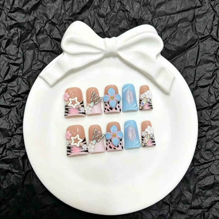 Artistic Nail Art Press-On Set with Floral and Gem Accents