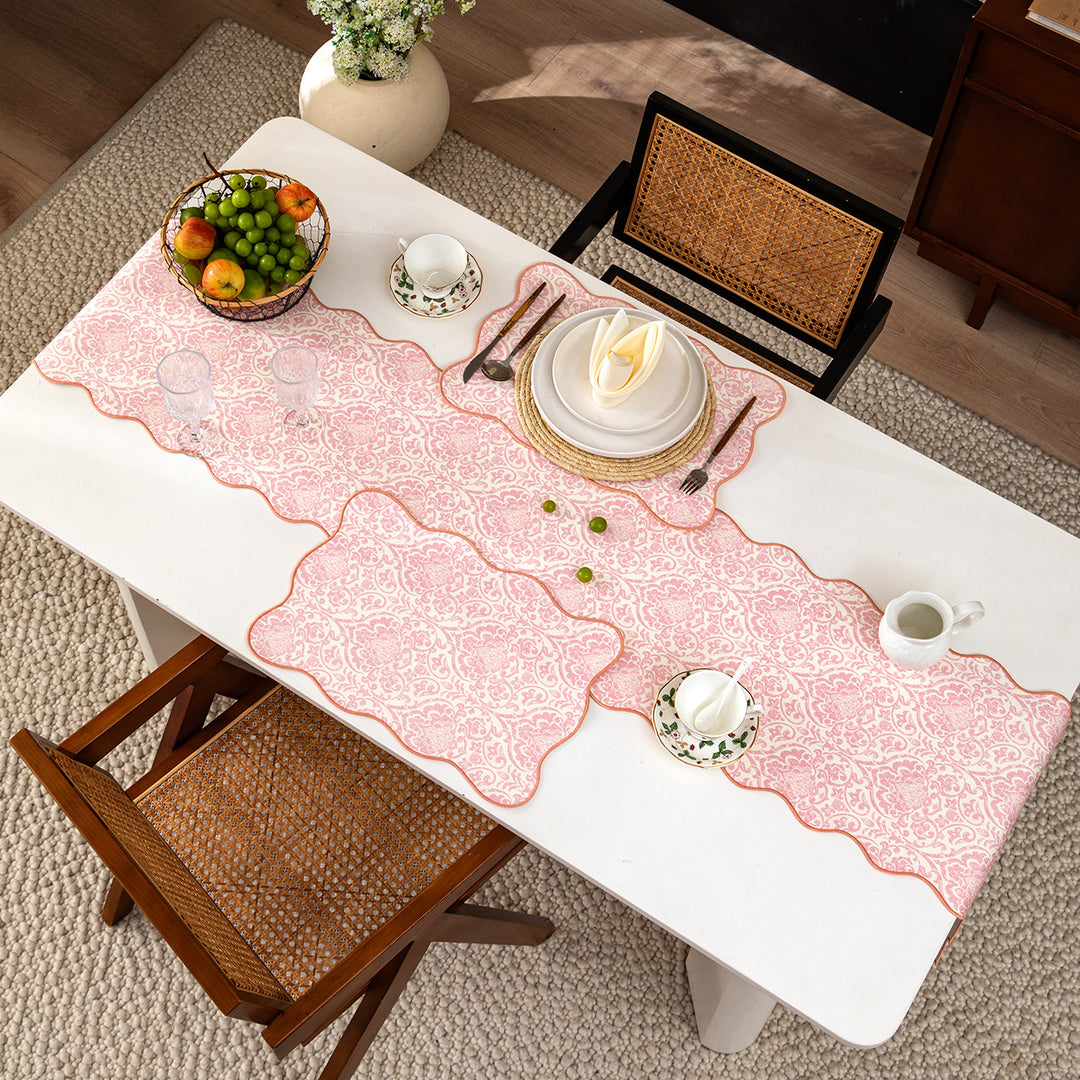 Elegant table runner with wavy hem and baroque damask pattern