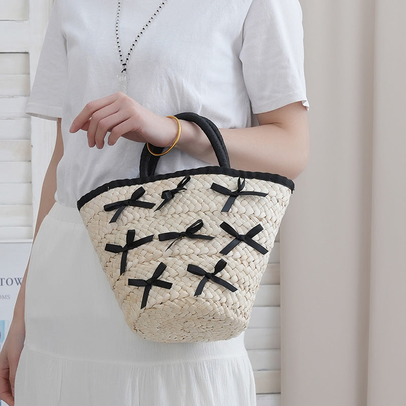 Basket bag with delicate bows and padded edge Kalsten