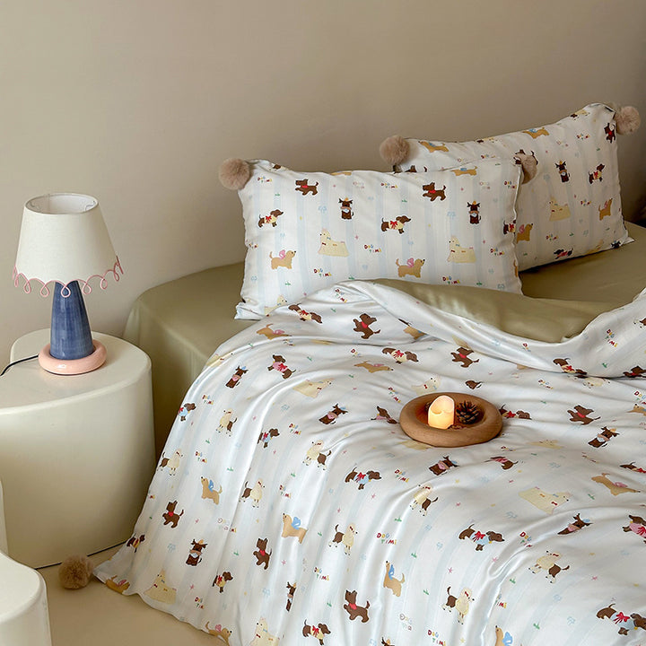 Children's bedding set with cute bunny print, pom-pom corners, and soft cotton satin