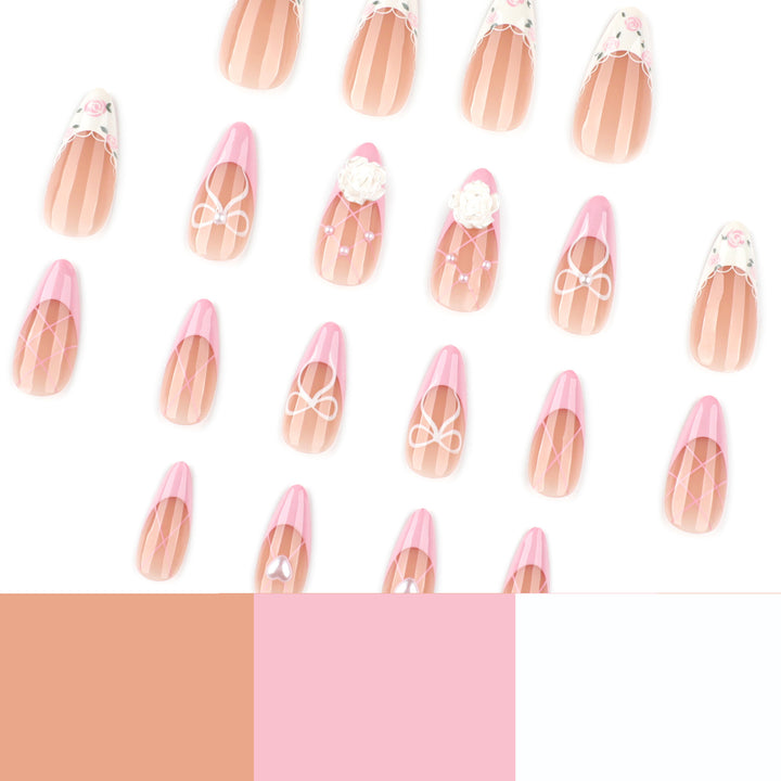 Artful nail art with floral details and bow embellishments Kalsten