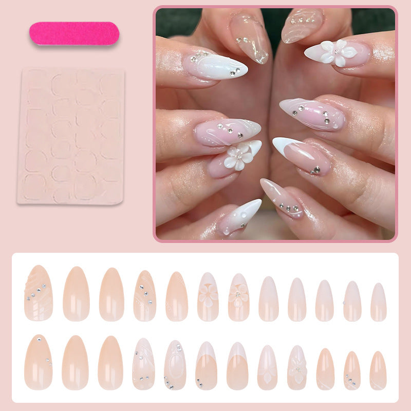 Art nail set with elegant flower and glitter details Kalsten