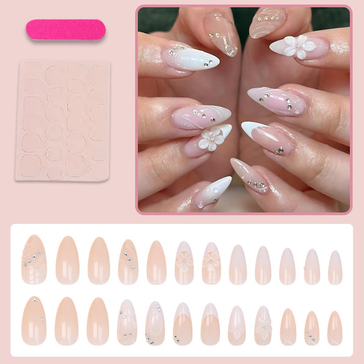 Art nail set with elegant flower and glitter details Kalsten