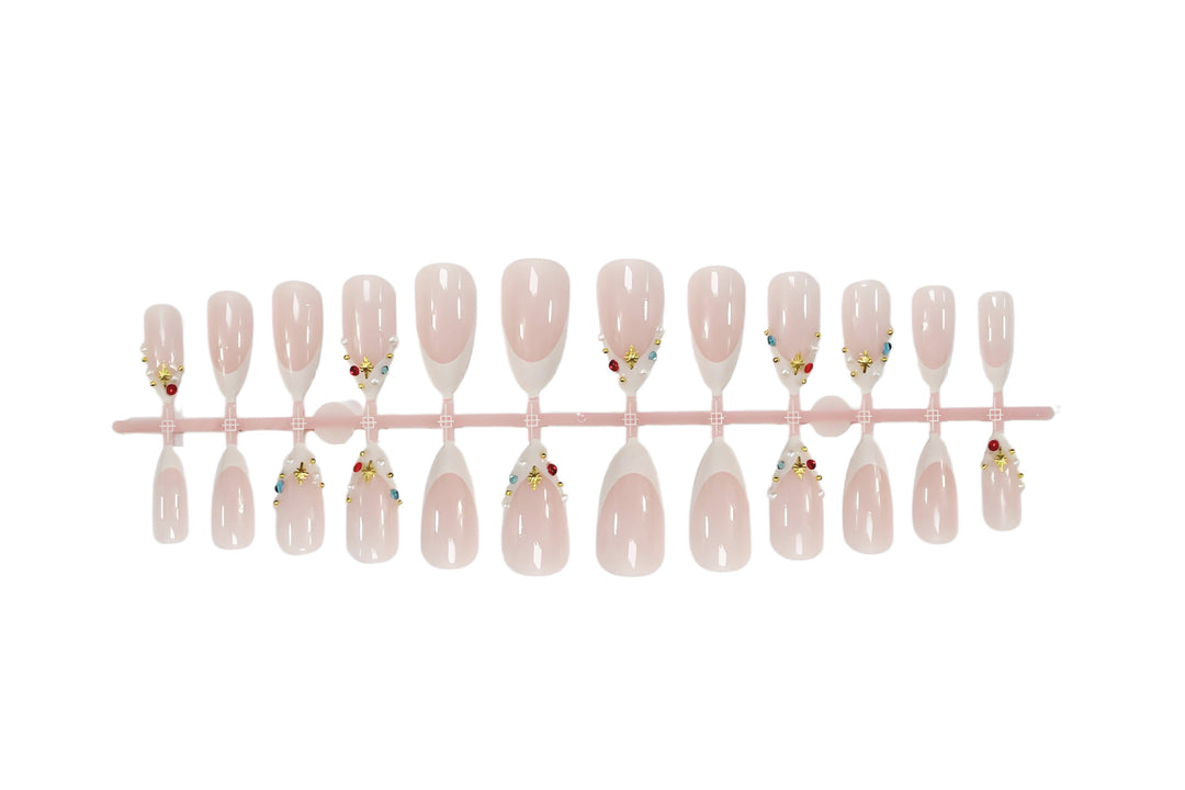 Acrylic nail set with glamorous embellishments and elegant accents Kalsten