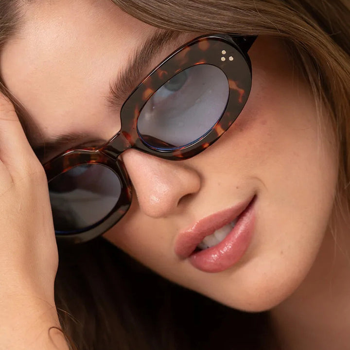 Ladies fashionable sunglasses with unique oval frame and protective lenses Kalsten
