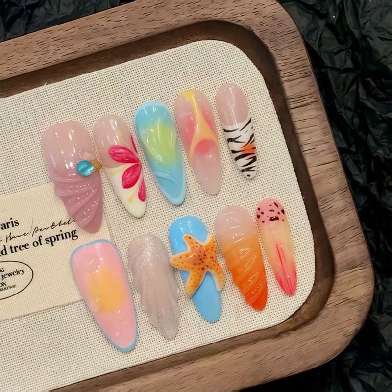 Nail art set with floral patterns and ombre effects Kalsten