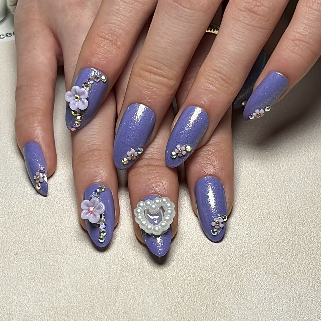 Artistic Nail Art with Floral Decorations Kalsten