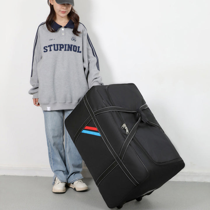 Spacious travel bag with lightweight wheels and reinforced carrying handle Kalsten