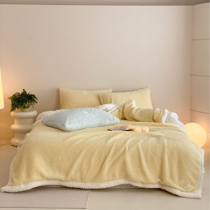Cozy Sherpa blanket with reversible fleece lining