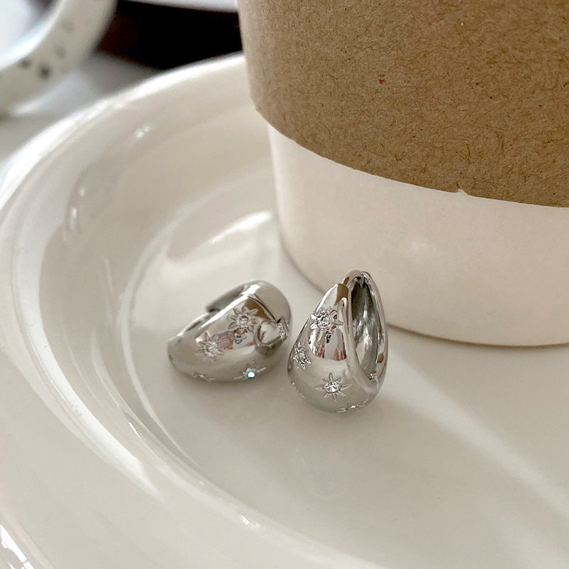 Fashionable earrings with floral design Kalsten
