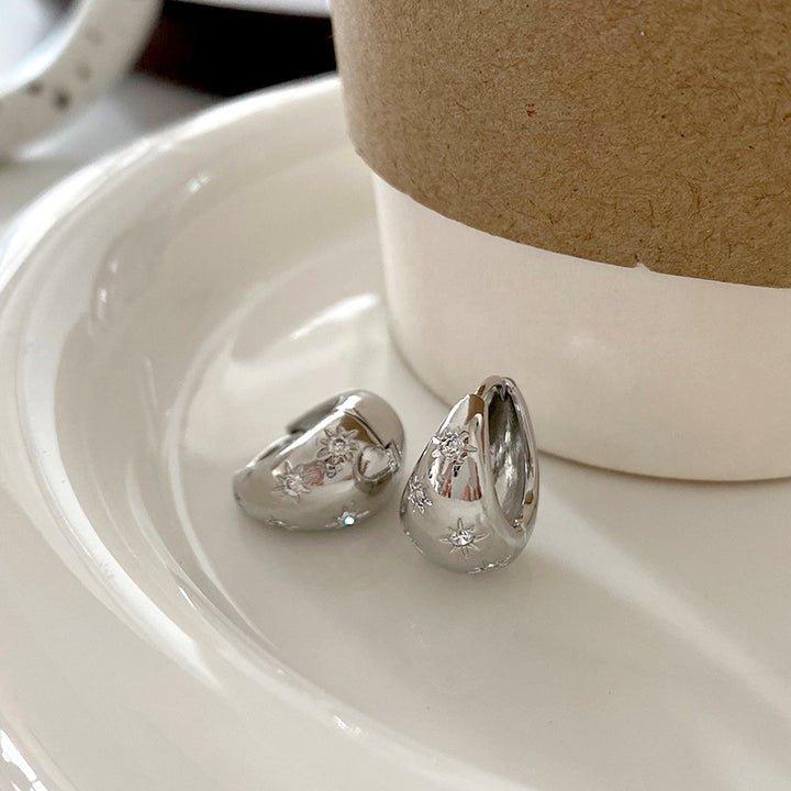 Fashionable earrings with floral design Kalsten
