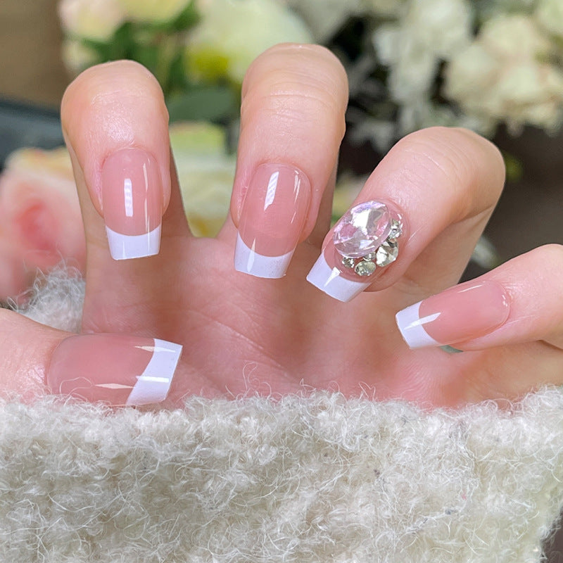 Elegant French Tip Press-On Nails with Decorative Rhinestone Accent Kalsten