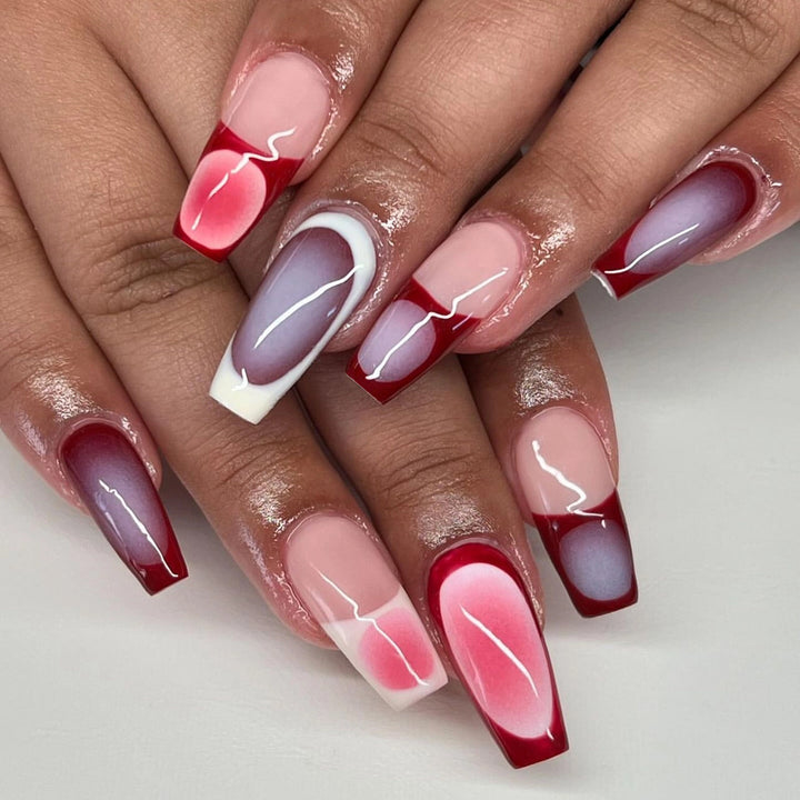 Artificial nail art with modern gradient and decorative accents Kalsten