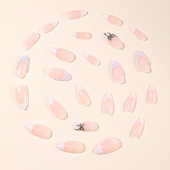 Elegant Pearl-Accentuated Stiletto Nail Art Kalsten