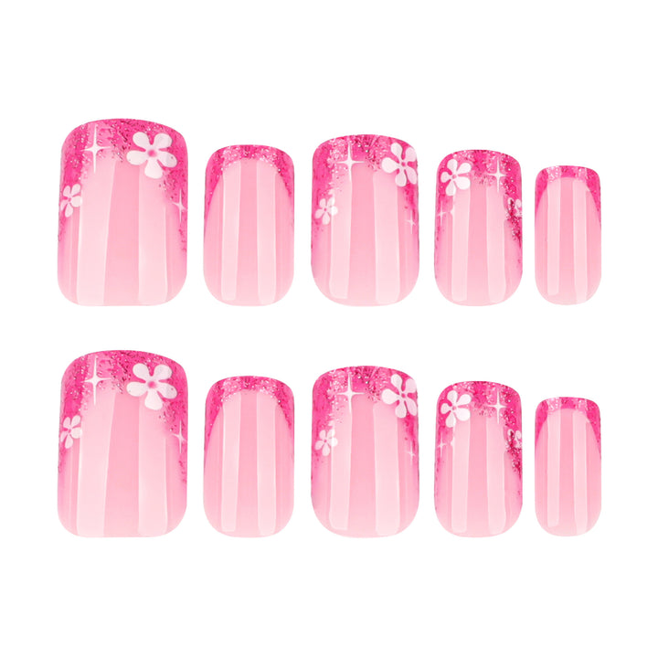 Artistic nail art with floral accent and glitter Kalsten