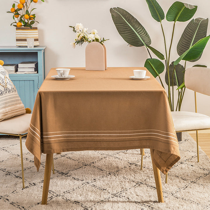 Rectangular tablecloth made of cotton-linen blend with fine embroidered stripe look and decorative tassels