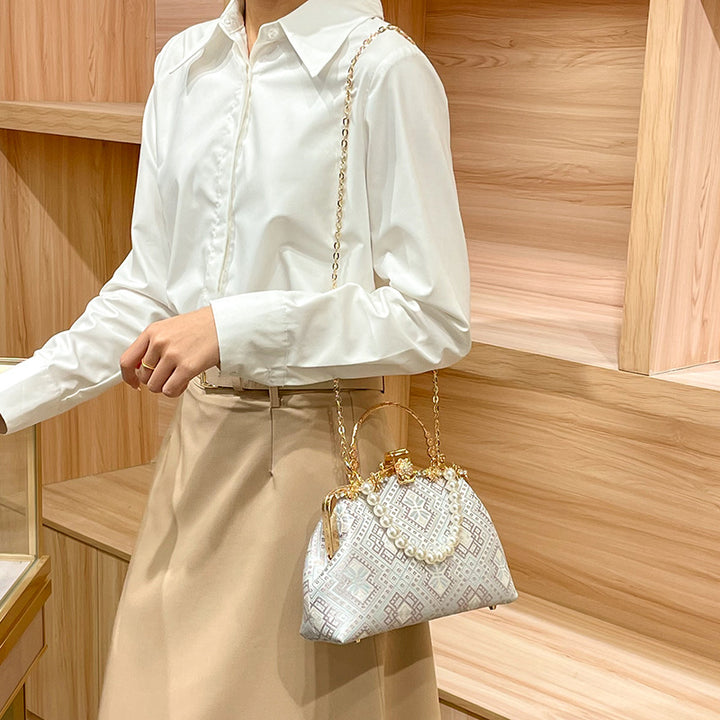 Elegant Pearl-Embellished Handbag