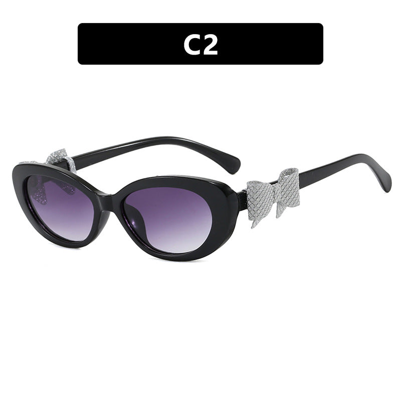 Women's fashionable sunglasses with playful bow design Kalsten