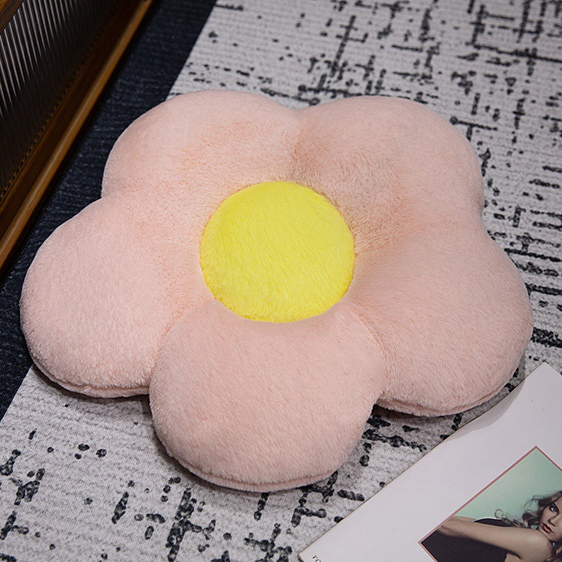 Padded seat cushion in flower shape with faux leather center piece and fluffy edge padding