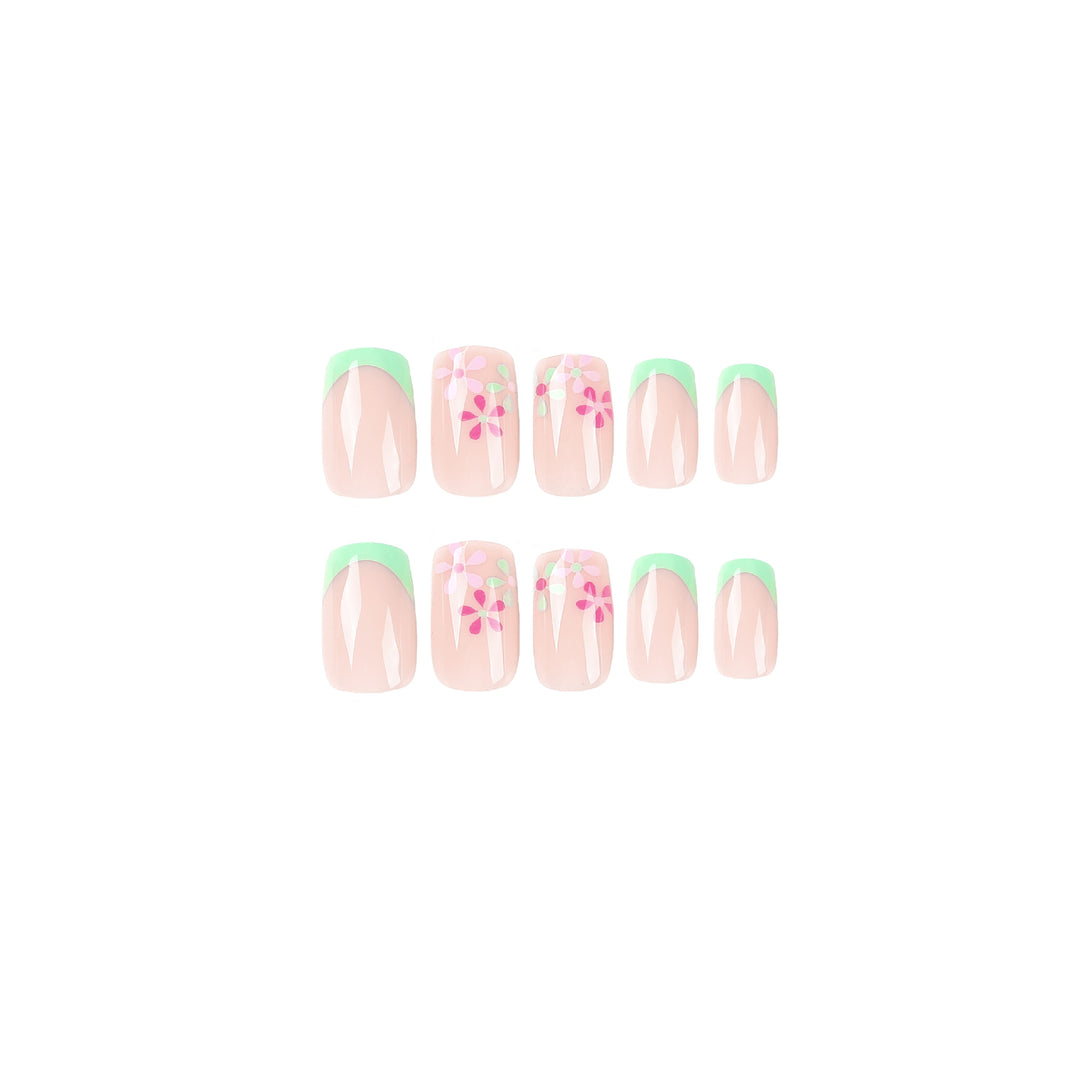 Artificial nails with floral accents and neon tips Kalsten