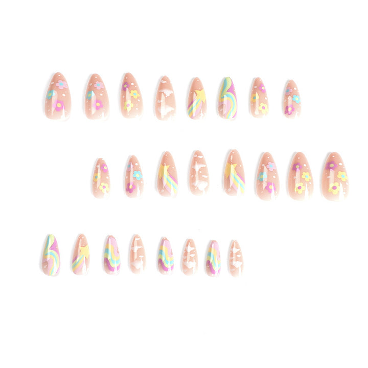 Artful nail art with cheerful designs and colorful accents Kalsten