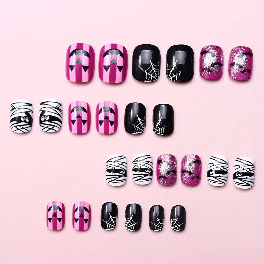 Creative nail art set with Halloween motifs and glitter accents Kalsten