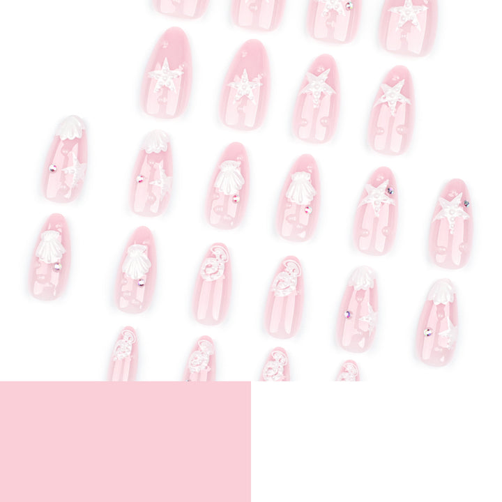 Artistic nail designs with shell and star motif Kalsten