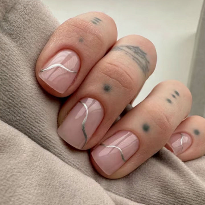 Acrylic nail set with elegant wave lines and shimmering accents Kalsten