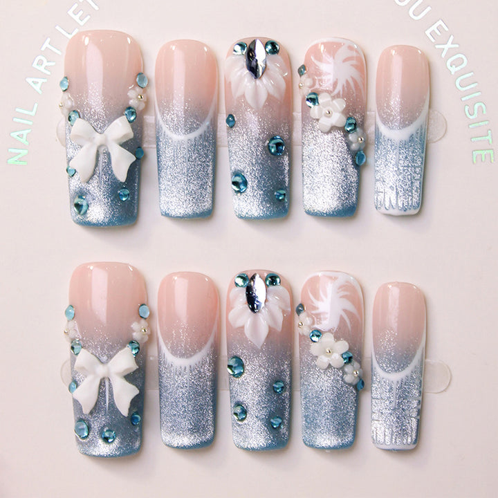 Acrylic nail set with elegant glitter design and fine embellishments Kalsten