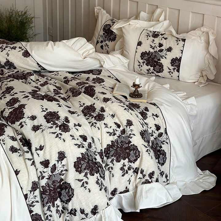 Romantic bedding set made of cotton-linen blend with floral jacquard border and ruffle