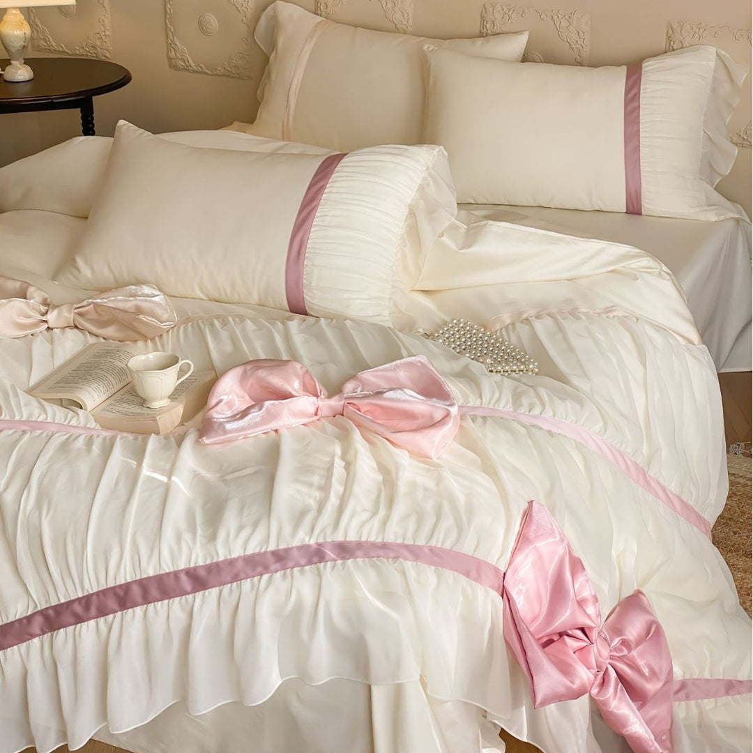 Bedding set with large satin bows, ruffled frill and decorative pillowcases