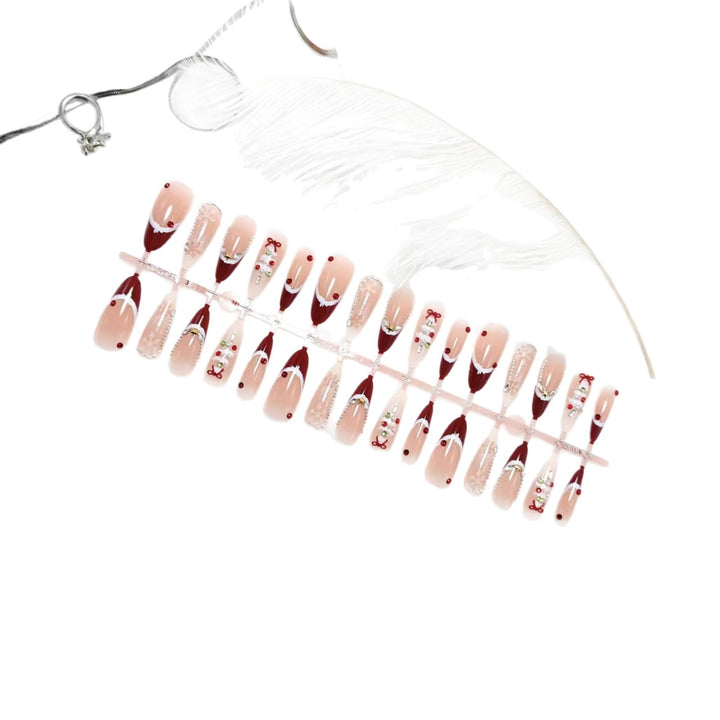 Artificial nails with festive designs and glitter accents Kalsten