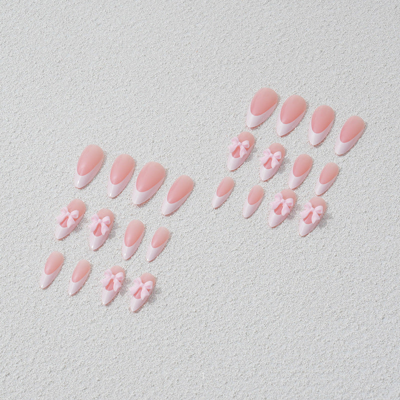 Nail art set with playful bow accents Kalsten